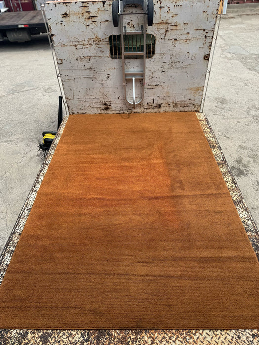 K047 | Oranje/bruin vloerkleed 300x200cm